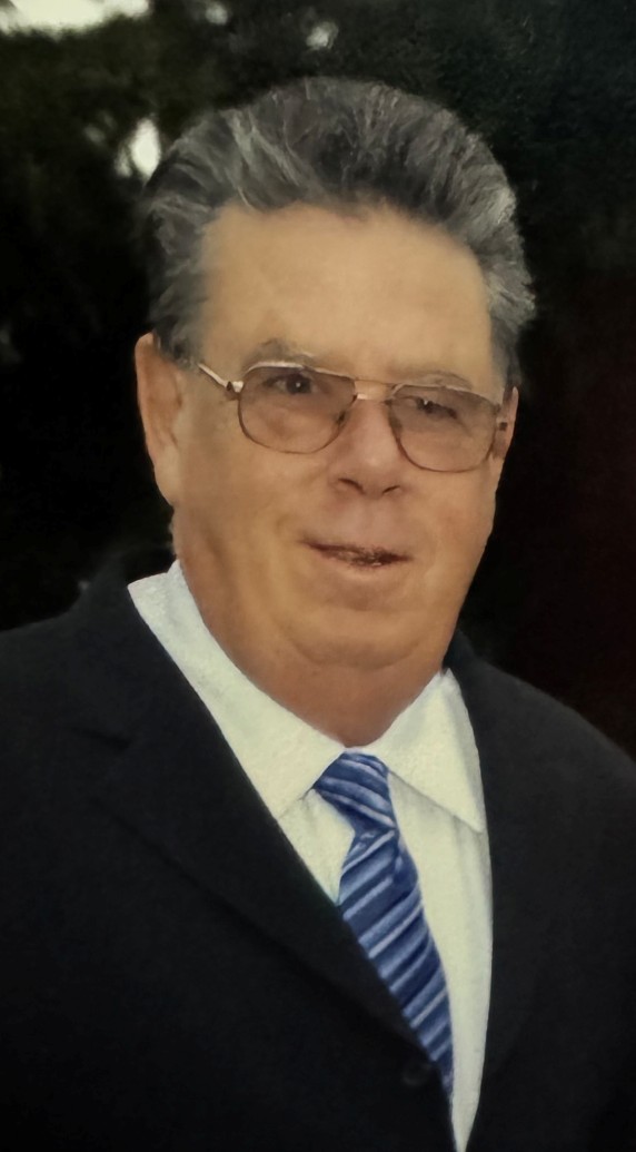 Peter E Holt